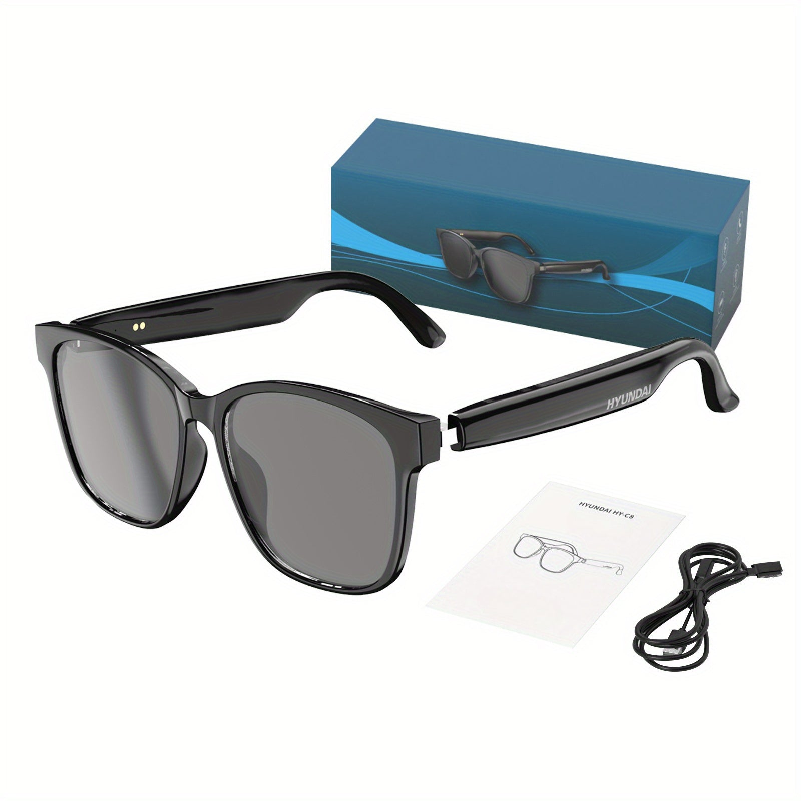 Black sunglasses with a blue box, black cable, and paper on a white background