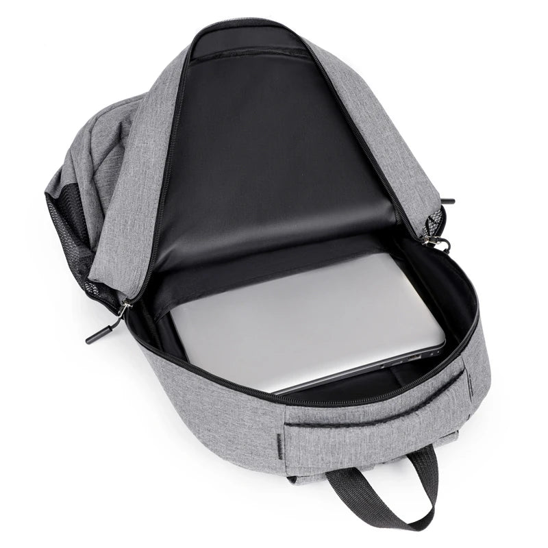 Stylish large-capacity backpack with multiple pockets, equipped with a laptop compartment and adjustable shoulder straps, perfec